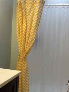 New shower curtain and a fresh coat of paint. Kristi went from loud to soft in her choice of paint.