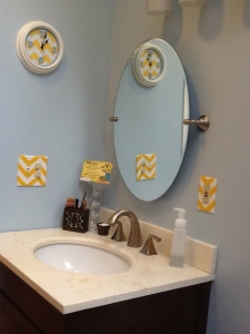 New vanity and mirror. I love this mirror. It opens up for storage, while looking great!